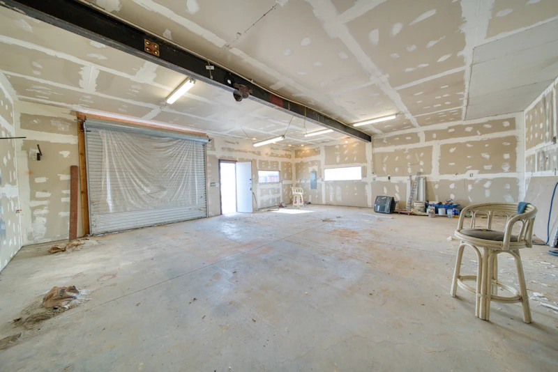 Wide room with newly finished pale walls